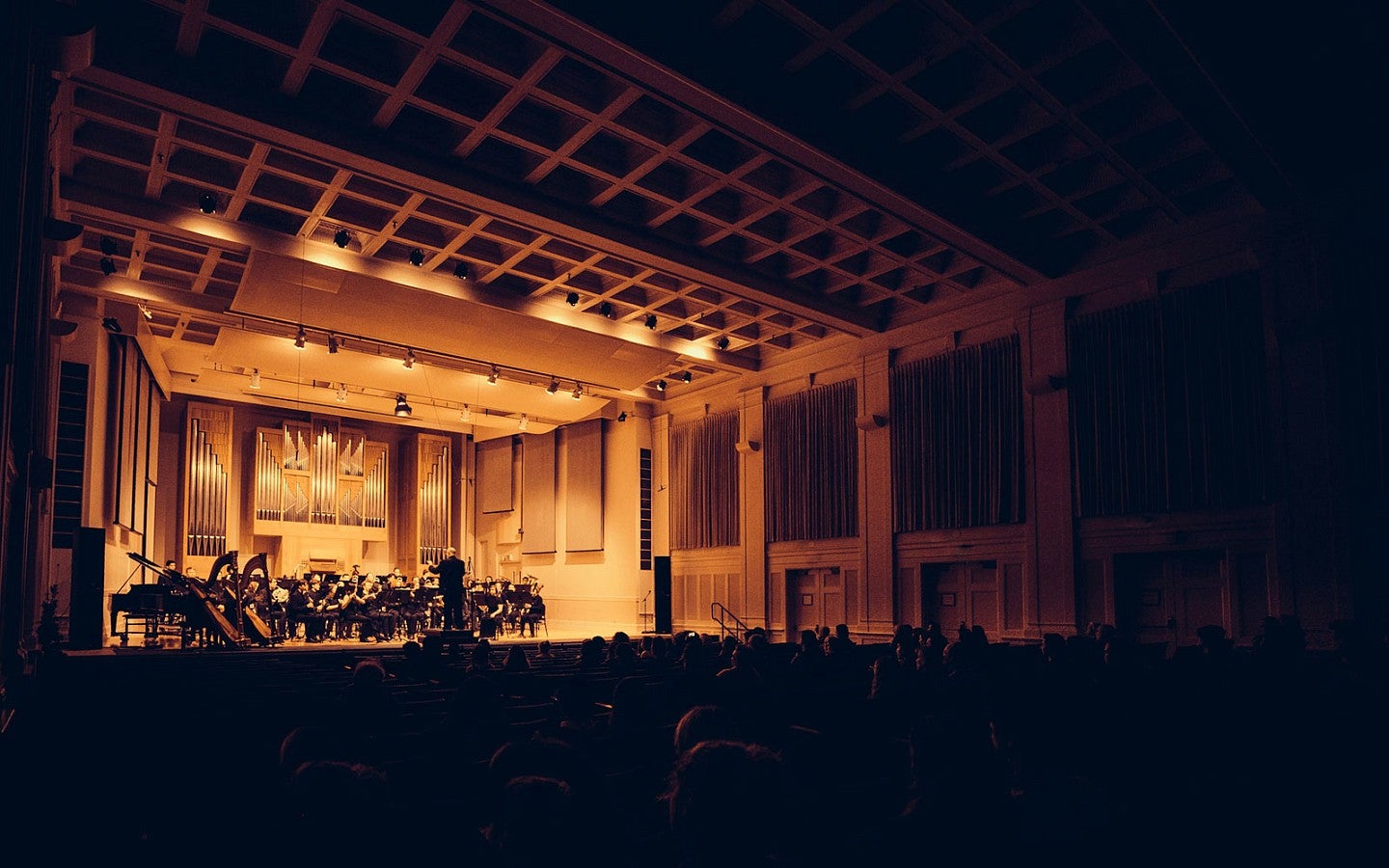 wind symphony performing onstage at UO's Beall Concert Hall